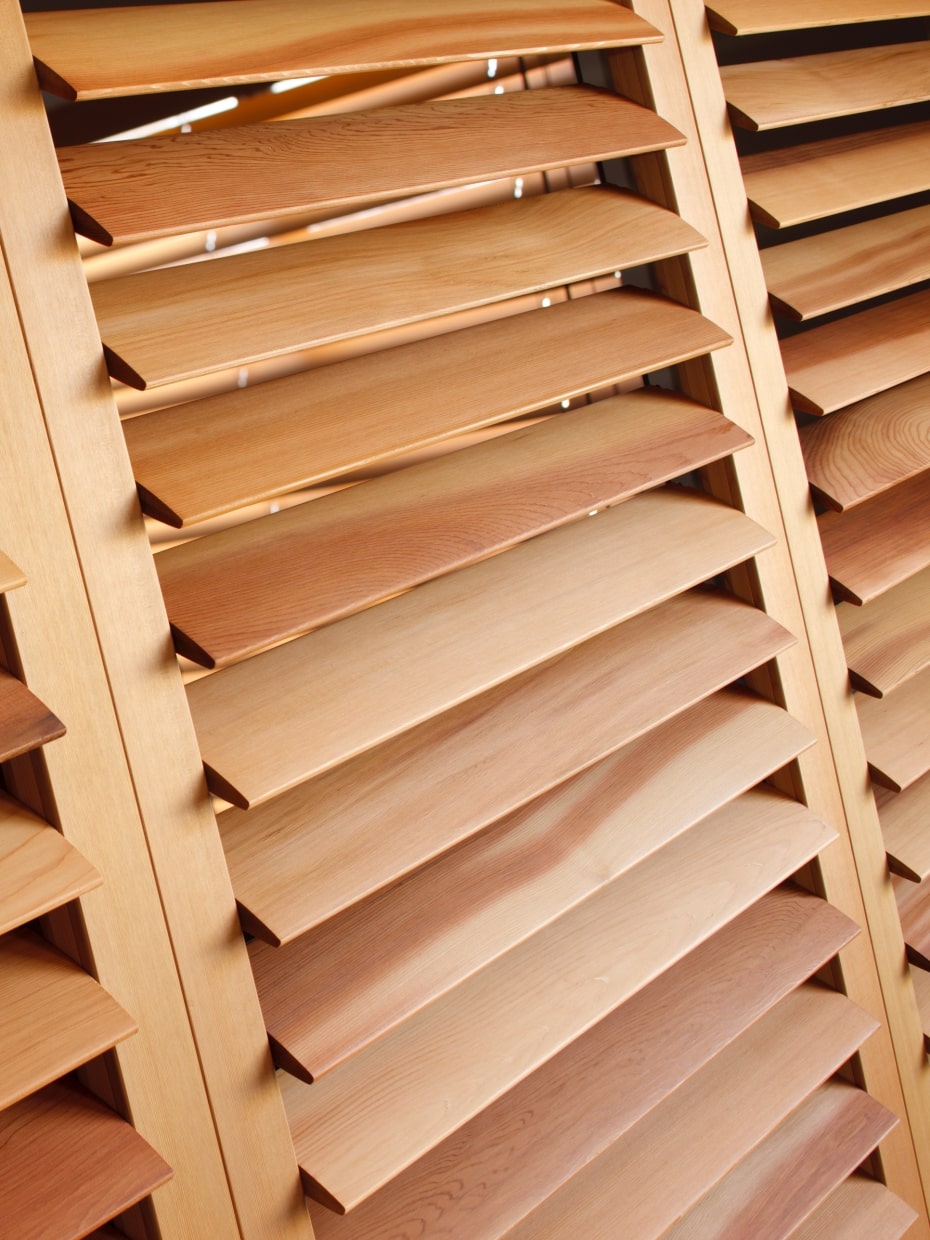 Close-up of natural wood plantation shutter louvers